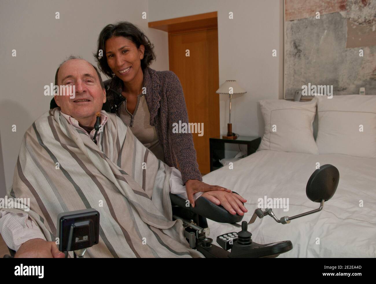 EXCLUSIVE - Philippe Pozzo di Borgo, who became quadriplegic after a paragliding accident in 1993, poses with his wife Khadija at their home in Essaouira, Morocco, November 15, 2011. His story inspired the movie 'Intouchables' directed by Olivier Nakache and Eric Toledano, released in France on November 2011, in which the actor Francois Cluzet plays his role and actor Omar Sy plays Abdel Seliou's role. In France, the movie reached 10 million of filmgoers. Photo by William Stevens/ABACAPRESS.COM Stock Photo