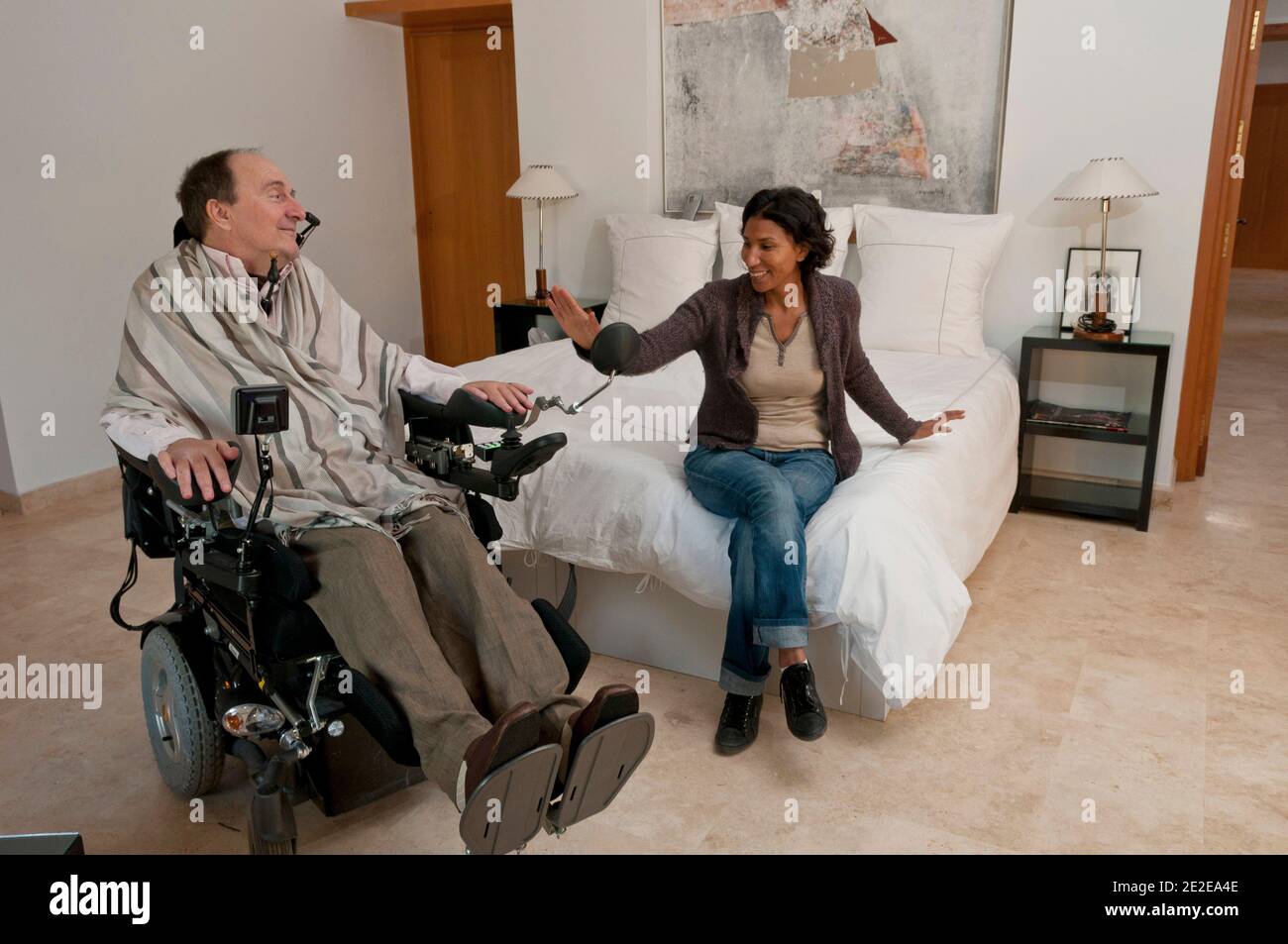 EXCLUSIVE - Philippe Pozzo di Borgo, who became quadriplegic after a paragliding accident in 1993, poses with his wife Khadija at their home in Essaouira, Morocco, November 15, 2011. His story inspired the movie 'Intouchables' directed by Olivier Nakache and Eric Toledano, released in France on November 2011, in which the actor Francois Cluzet plays his role and actor Omar Sy plays Abdel Seliou's role. In France, the movie reached 10 million of filmgoers. Photo by William Stevens/ABACAPRESS.COM Stock Photo