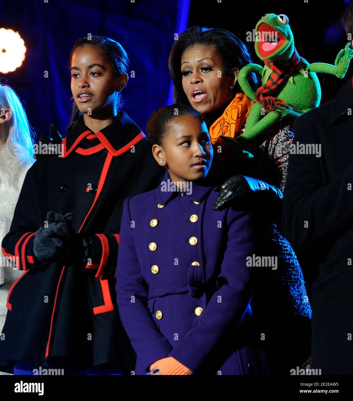 First Lady Michelle Obama, daughters Malia (L) and Sasha, and Kermit the Frog sing during the 2011 National Christmas Tree Lighting on the Ellipse in Washington, DC, USA on December 1, 2011.Photo by Roger L. Wollenberg/Pool/ABACAPRESS.COM Stock Photo