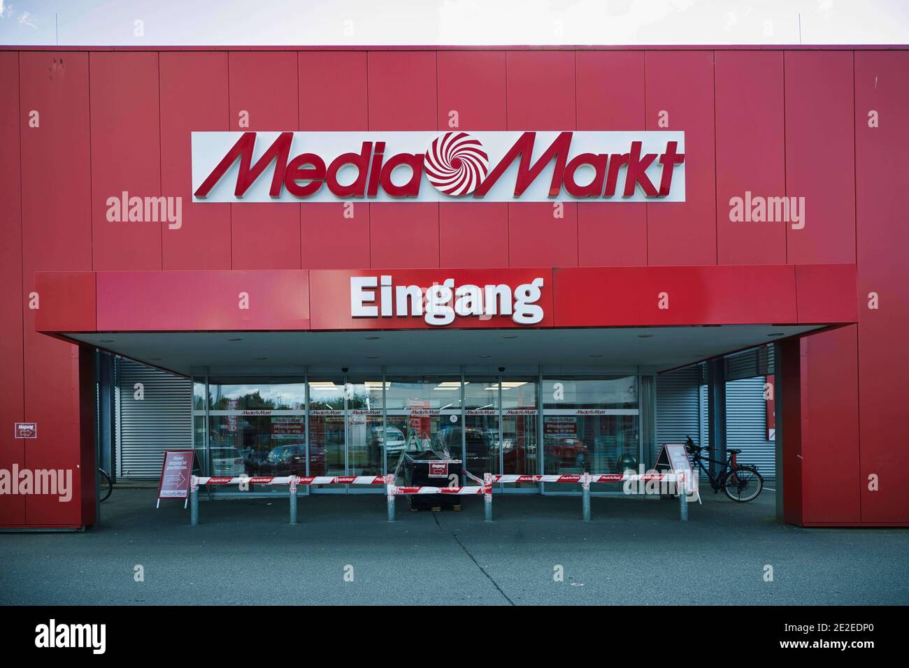 SCHWENTINENTAL, GERMANY - Jul 20, 2020: Schwentinental, Germany, July 20,  2020 - empty entrance of Media-Markt with red barrier tapeElectronics  retail Stock Photo - Alamy