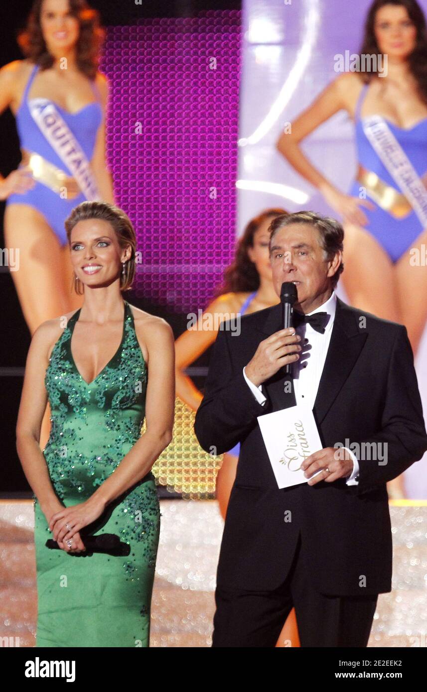 Former Miss France and Miss France society president Sylvie Tellier and  French TV host Jean-Pierre Foucault during the 65th edition of the beauty  contest, France 2012, in Brest, northwestern France on December