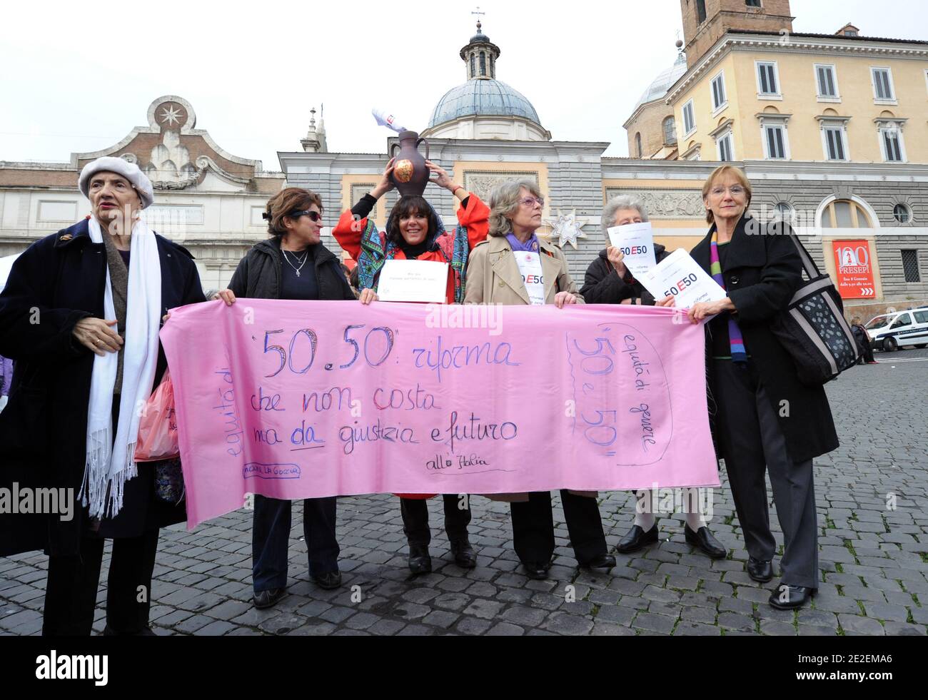 Thousands of italian women rallied for more equal future in Rome, Italy on December 11, 2011. The slogans were ' 50 - 50' and 'If not now, when?', the same that earlier this year spurred a nationwide protest against the image of Italian women that Berlusconi was giving to the world. A prime cause of Italy's recent low growth is female participation in the workforce which, according to the World Economic Forum, is lower than in any other European country except Macedonia. In the 2011 WEF global gender gap report, it was ranked 48 places behind Mozambique - 74th out of the 135 countries surveyed Stock Photo