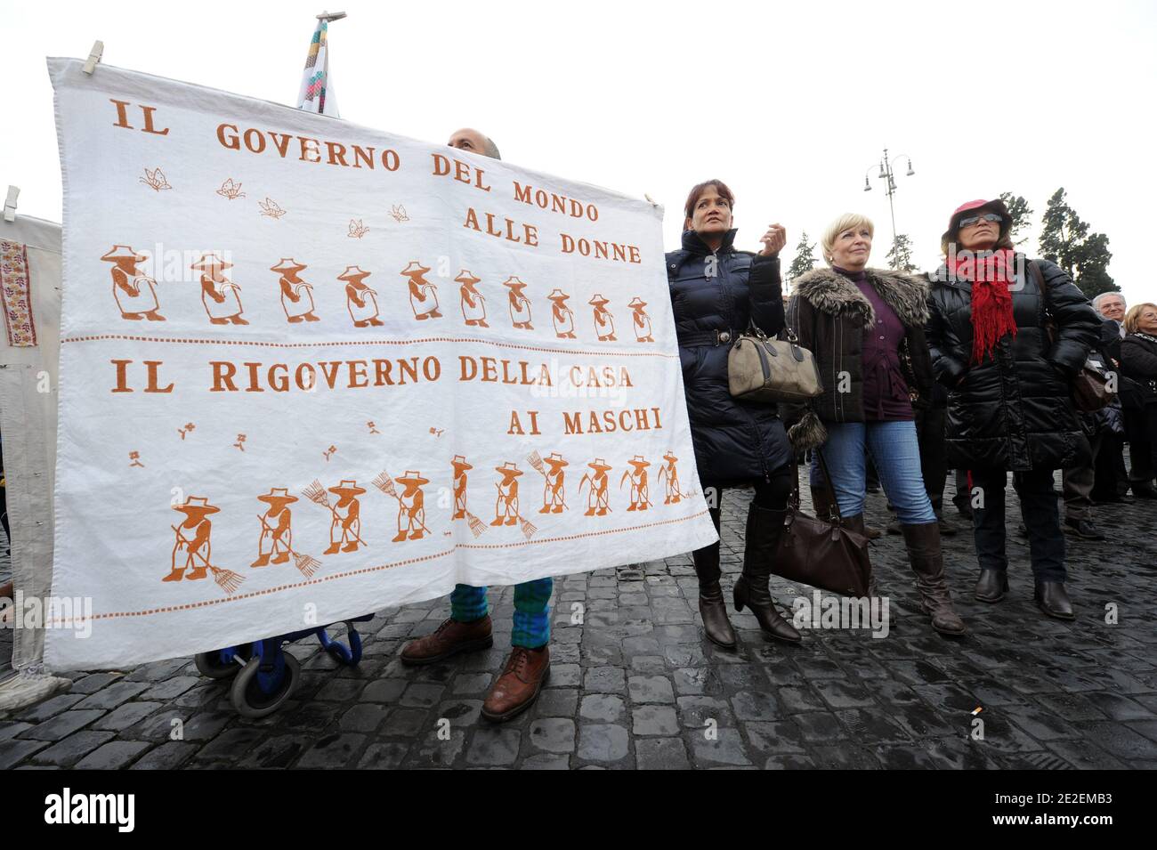 Thousands of italian women rallied for more equal future in Rome, Italy on December 11, 2011. The slogans were ' 50 - 50' and 'If not now, when?', the same that earlier this year spurred a nationwide protest against the image of Italian women that Berlusconi was giving to the world. A prime cause of Italy's recent low growth is female participation in the workforce which, according to the World Economic Forum, is lower than in any other European country except Macedonia. In the 2011 WEF global gender gap report, it was ranked 48 places behind Mozambique - 74th out of the 135 countries surveyed Stock Photo