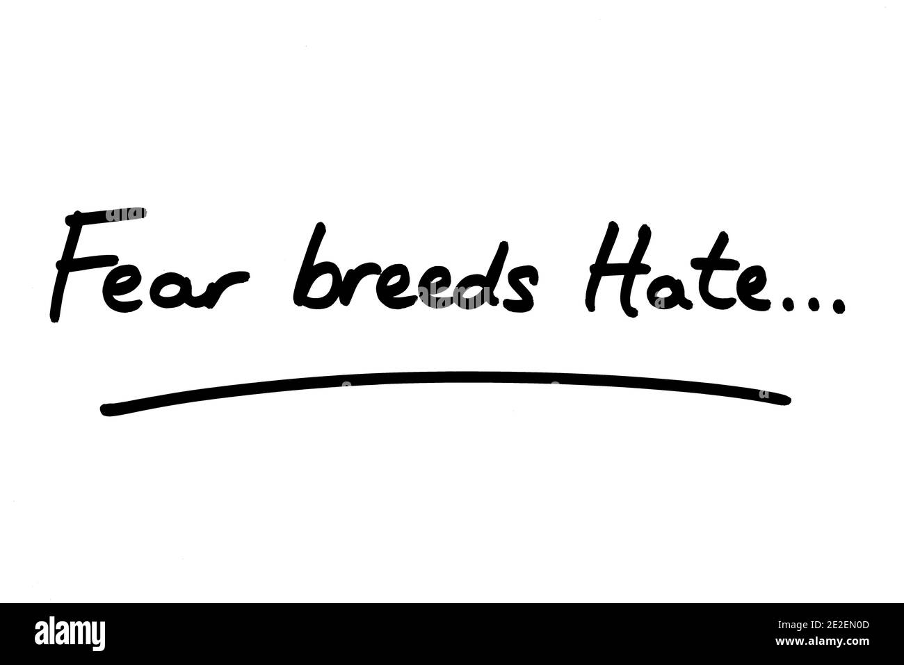 Fear Breeds Hate…handwritten on a white background. Stock Photo
