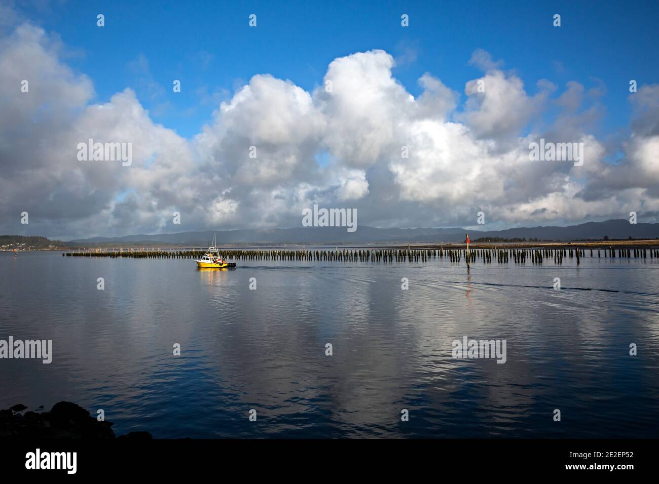 Near confluence of the columbia river and pacific ocean hires stock