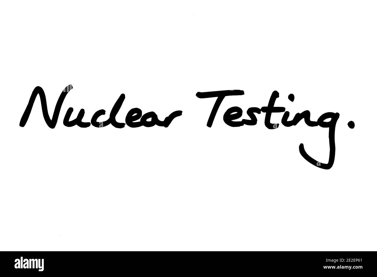 Nuclear Testing, handwritten on a white background. Stock Photo