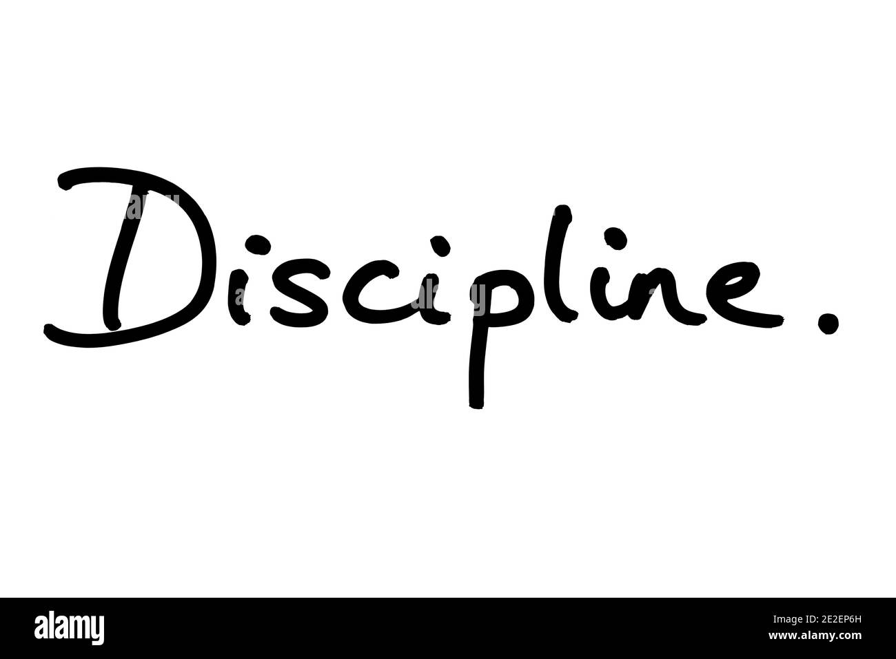 The word Discipline, handwritten on a white background. Stock Photo
