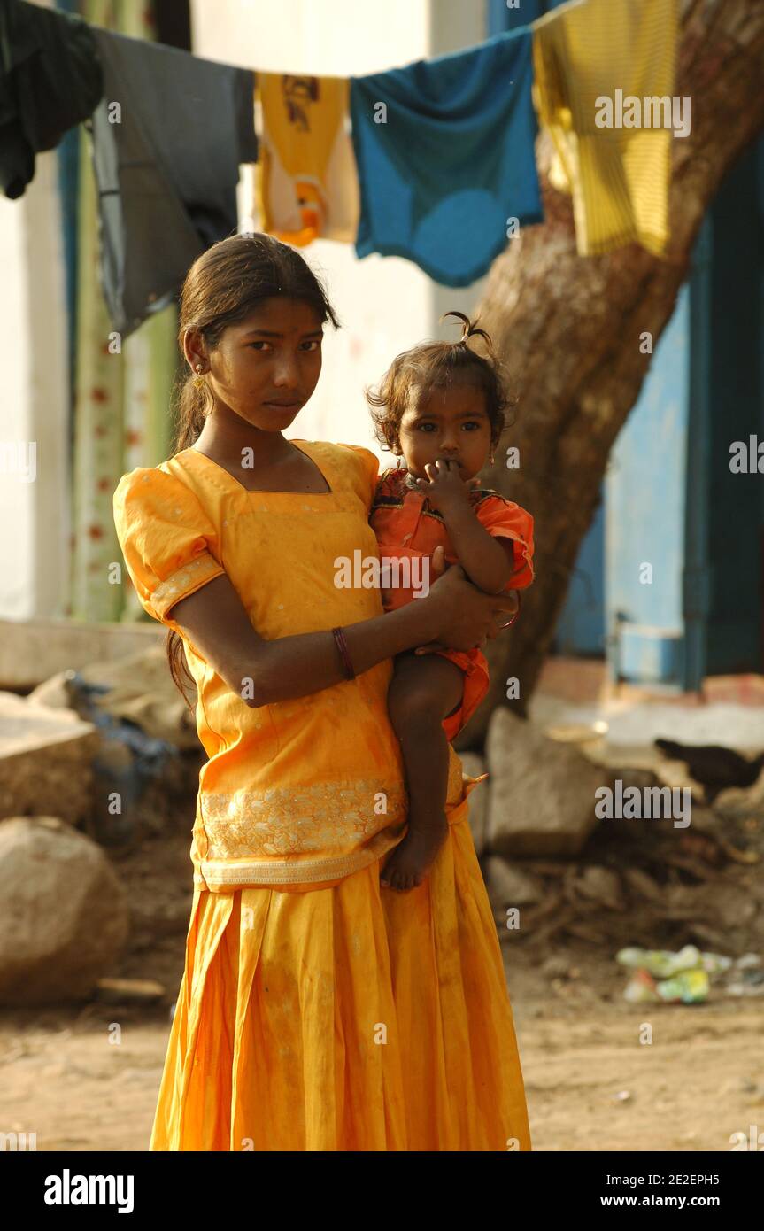 Portrait Of A Young Indian Woman Baby Hampi India March 08 Hampi Is A Village In Karnataka State In India It Is Located Inside The Walls Of The Ruined City Of Vijayanagara 500
