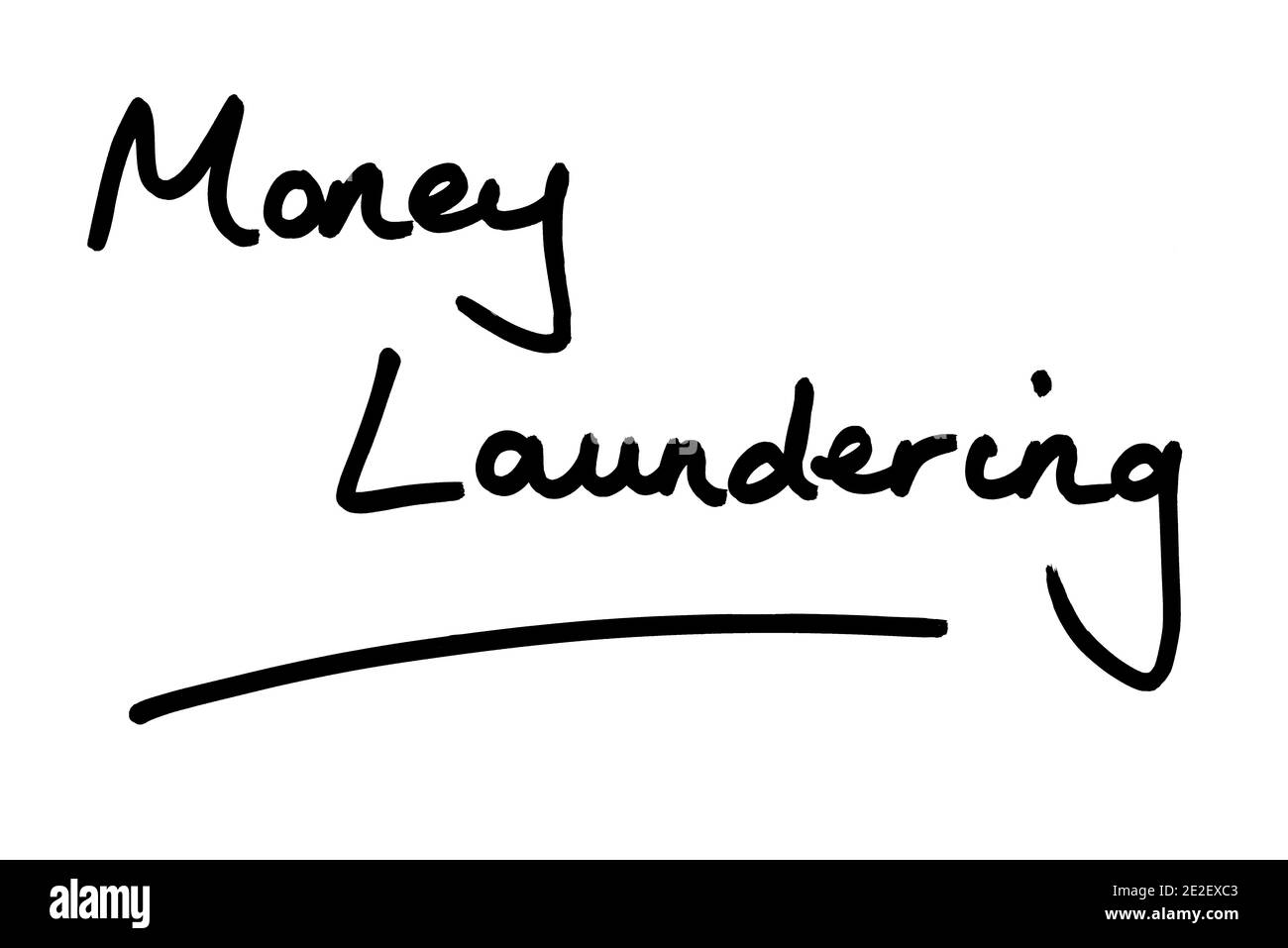 Money Laundering handwritten on a white background. Stock Photo