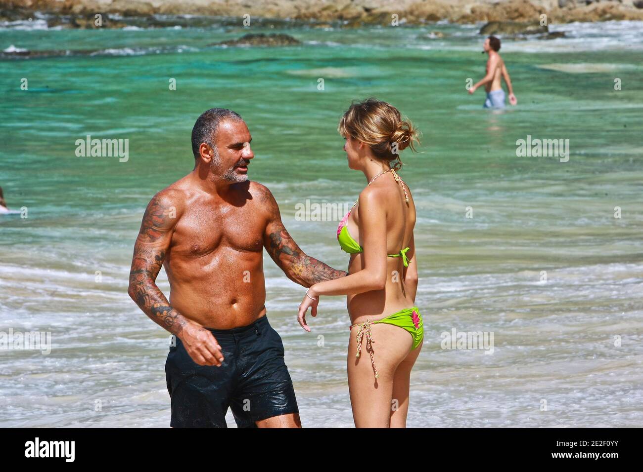 EXCLUSIVE - Christian Audigier and Nathalie Sorensen on a Surin beach in  Phuket, Thailand on December 29, 2011. Photo by Christian  Mouchet/ABACAPRESS.COM Stock Photo - Alamy