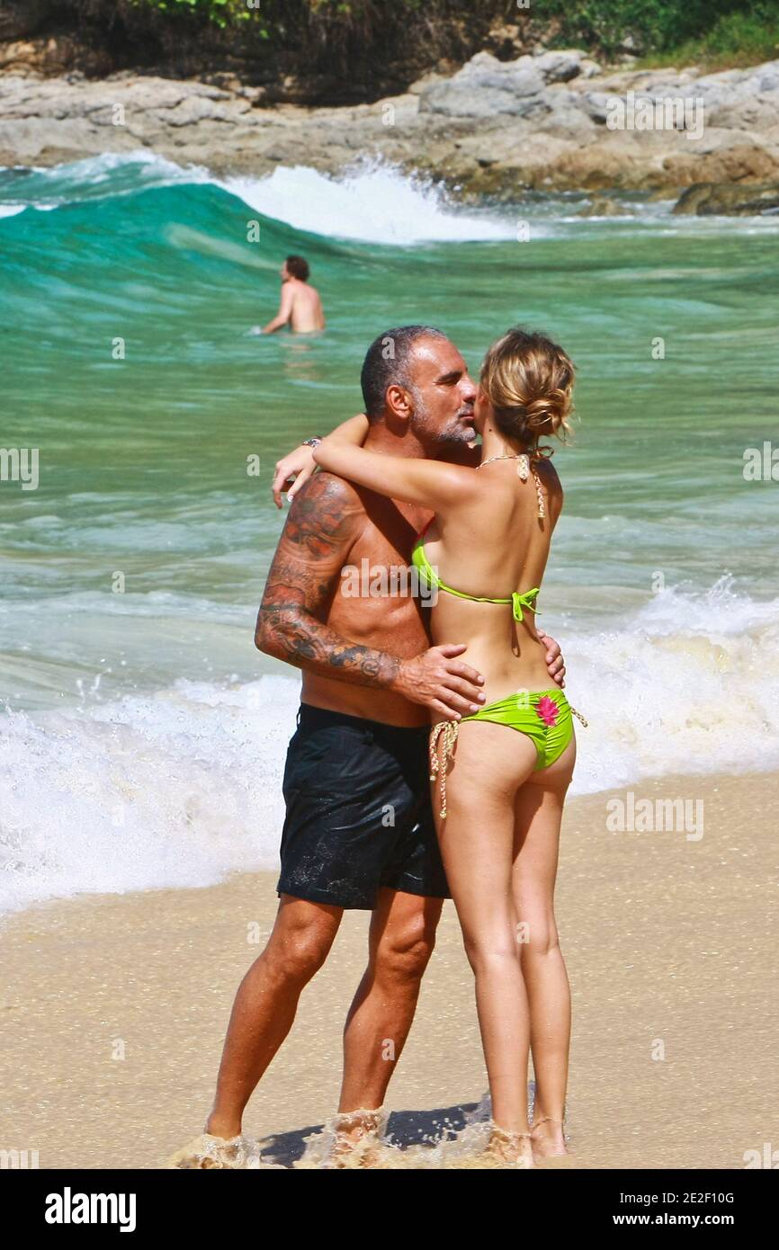 EXCLUSIVE - Christian Audigier and Nathalie Sorensen on a Surin beach in  Phuket, Thailand on December 29, 2011. Photo by Christian  Mouchet/ABACAPRESS.COM Stock Photo - Alamy