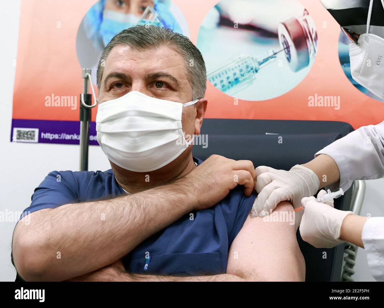 Ankara. 14th Jan, 2021. Turkish Health Minister Fahrettin Koca receives a dose of China's Sinovac COVID-19 vaccine in Ankara, Turkey, Jan. 13, 2021. Credit: Xinhua/Alamy Live News Stock Photo