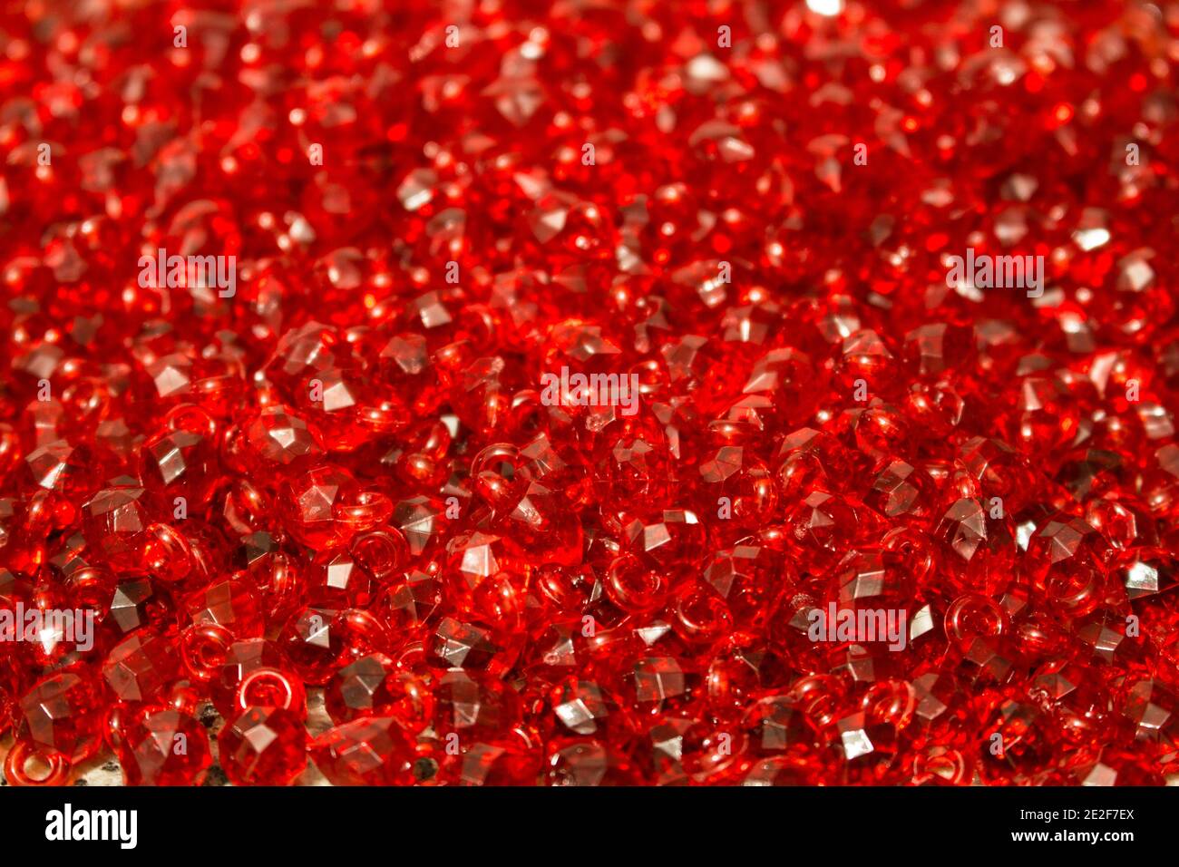 Group of bright red glass beads together for jewelllery Stock Photo