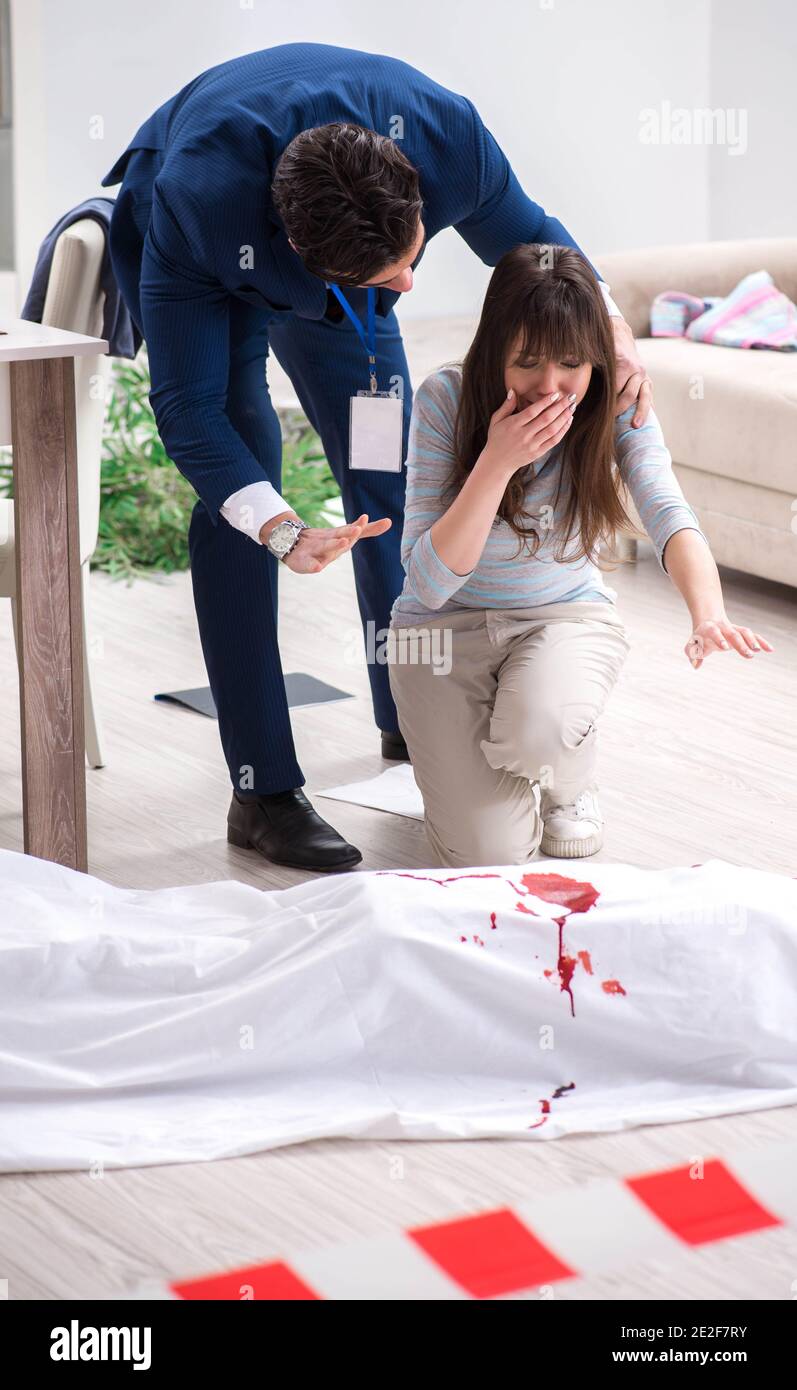 The victim wife at the scene on murder Stock Photo