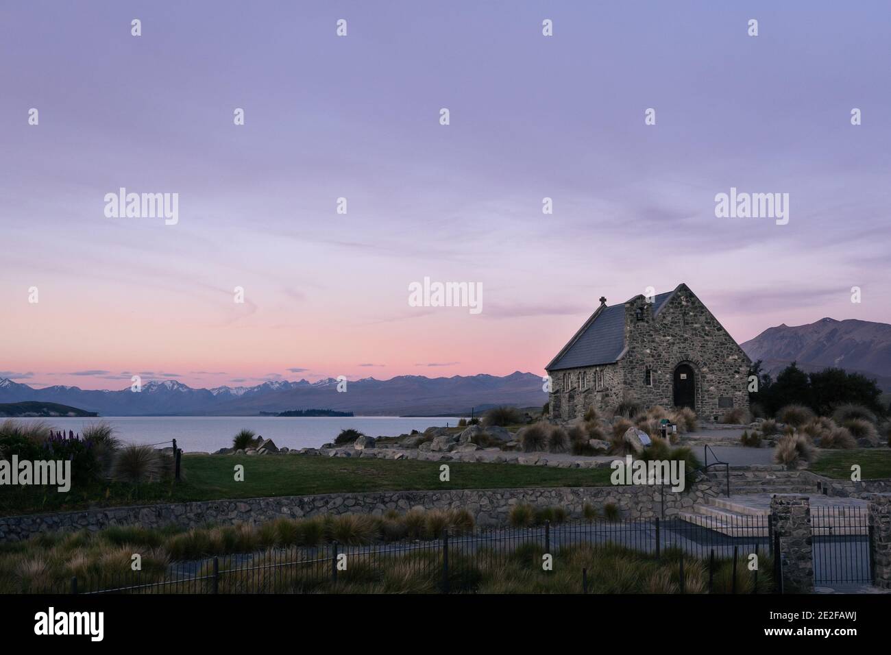 Historic Church of the Good Shepherd with amazing sunset landscape. Lake Tekapo, New Zealand. Stock Photo