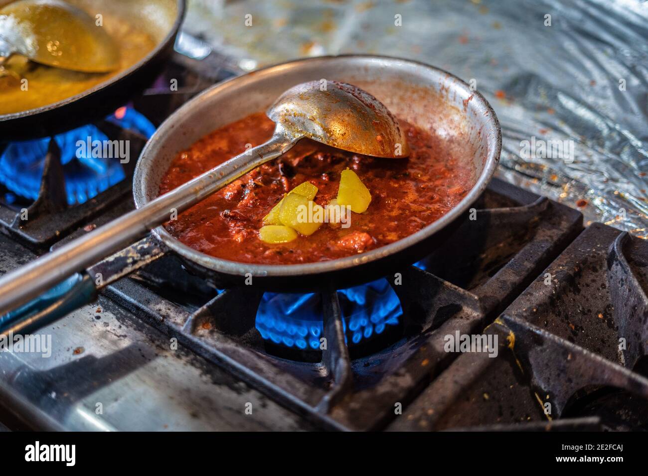 Cooking indian style cuisine food Stock Photo - Alamy