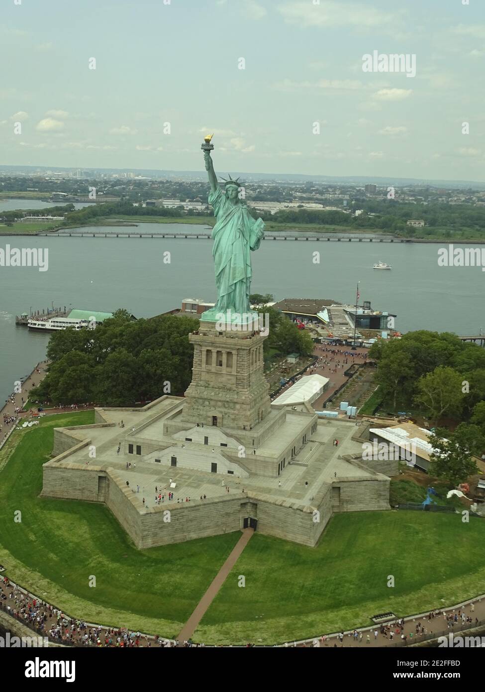 Vertical aerial shot of the Statue of Liberty in New York Stock Photo ...