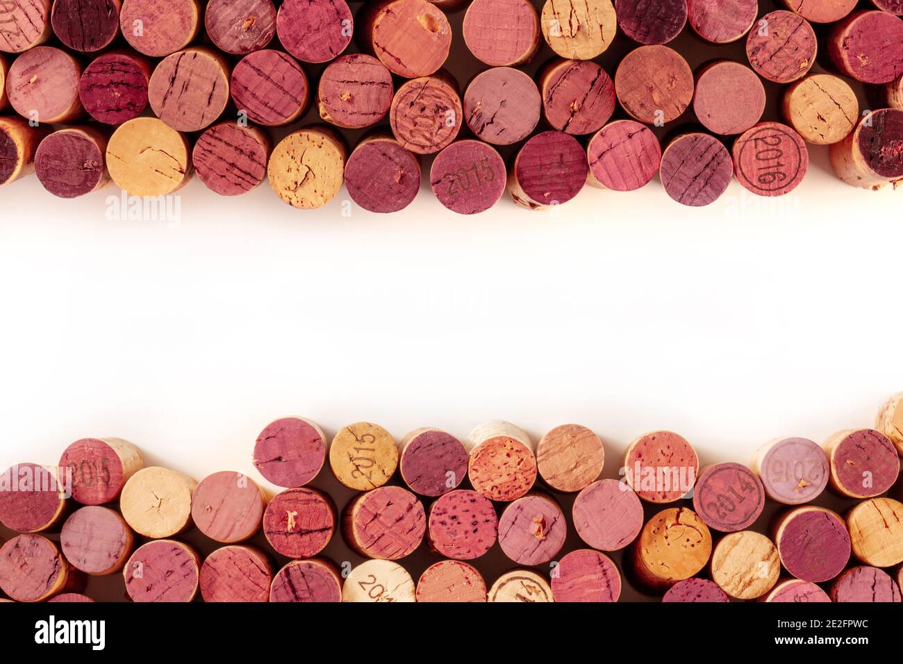 Wine corks, a design template for a restaurant menu or tasting invitation, shot from above with copy space, on a white background Stock Photo