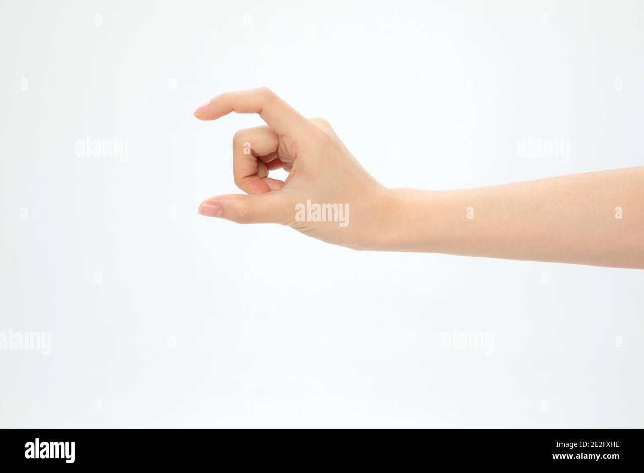 Caucasian hand showing small size hi-res stock photography and images ...