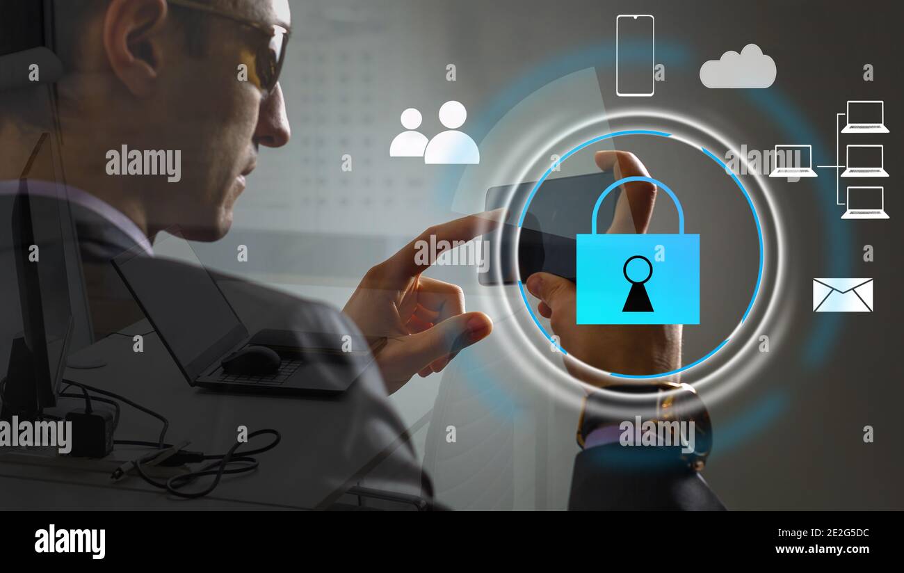 Cyber security network concept. Hand using smartphone with master key ...