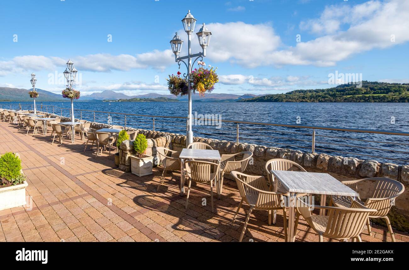 Looking out over loch Lomond from Duck Bay marina in Scotland on a sunny day with a blue sky Stock Photo
