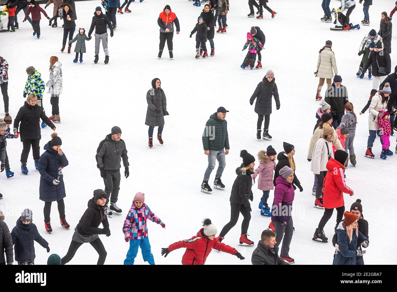 KYIV, UKRAINE - Jan. 03, 2021: Ice-skating people. People have fun in ...