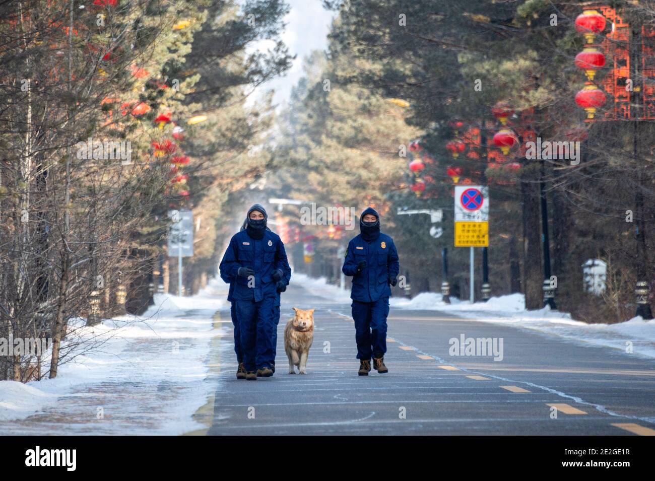 Mohe, China's Heilongjiang Province. 13th Jan, 2021. Firefighters exercise in Beiji Village of Mohe City, northeast China's Heilongjiang Province, Jan. 13, 2021. Firefighters stick to their post and keep training despite the freezing weather in Mohe, the northernmost city in China, where the temperature is often below minus 40 degrees Celsius in winter. Credit: Xie Jianfei/Xinhua/Alamy Live News Stock Photo