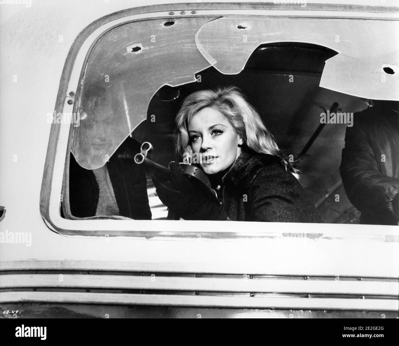 MARY URE firing Machine Gun from back of Bus in climactic chase in WHERE EAGLES DARE 1968 director BRIAN G. HUTTON story / screenplay Alistair MacLean music Ron Goodwin producers Elliot Kastner and Jerry Gershwin  Gershwin-Kastner Productions / Winkast Film Productions / Metro Goldwyn Mayer Stock Photo