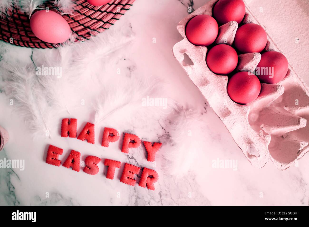 Easter holiday decorations, eggs on marble background. Stock Photo