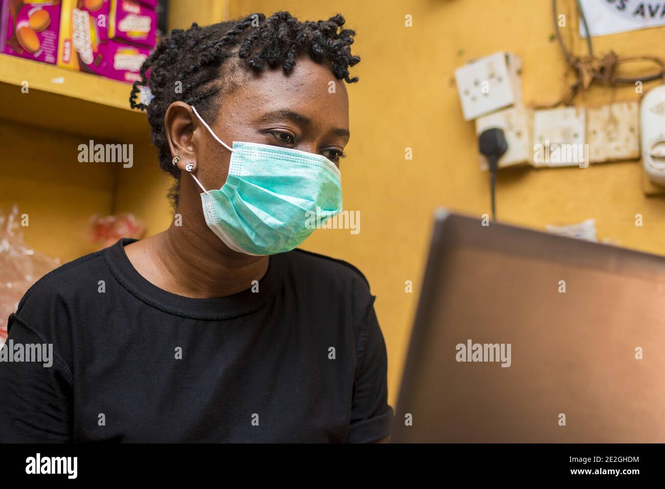 African woman in a facemask hi-res stock photography and images - Alamy