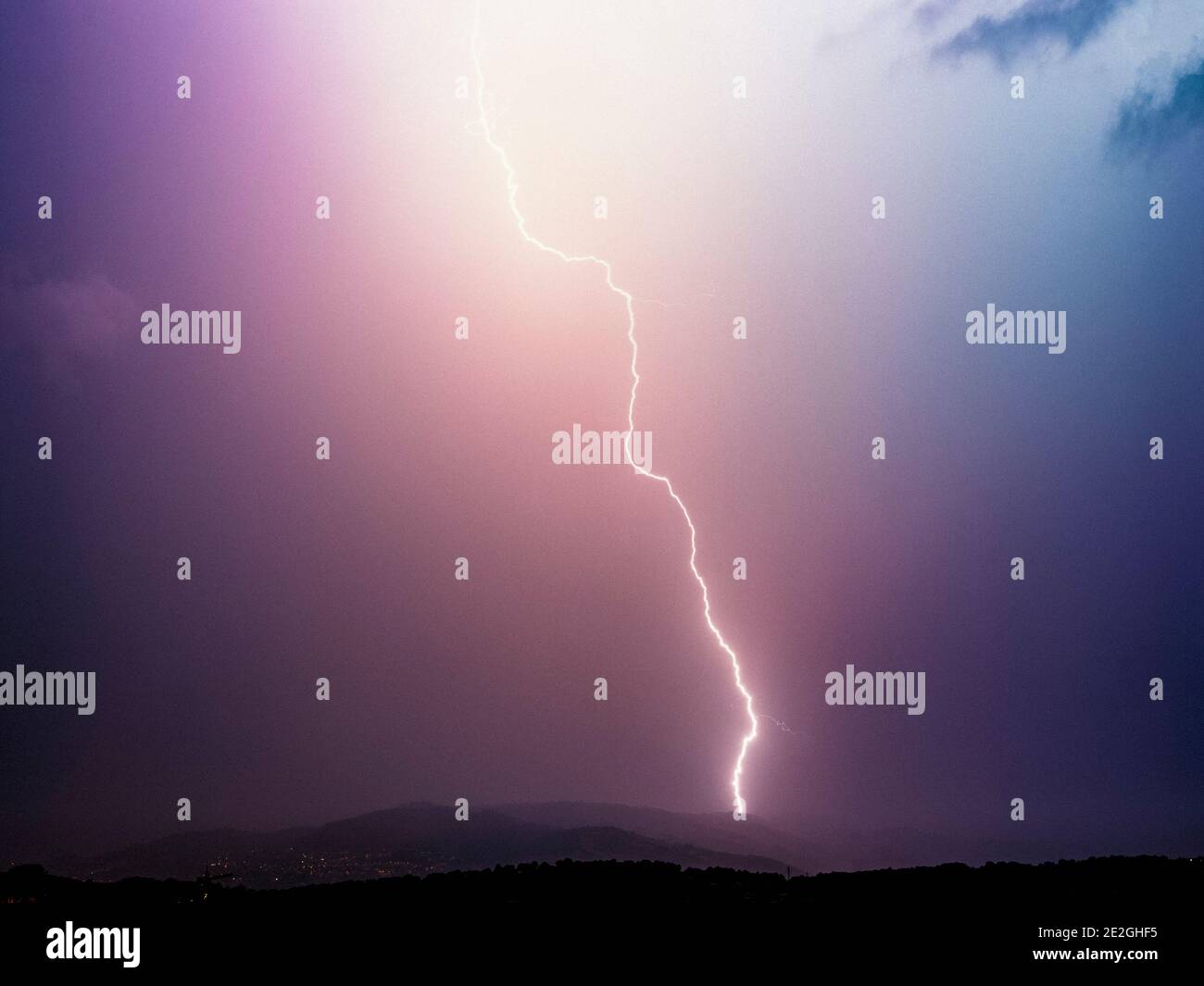 Lightning bolt in majestic stormy sky, Tanneron, French Riviera, France
