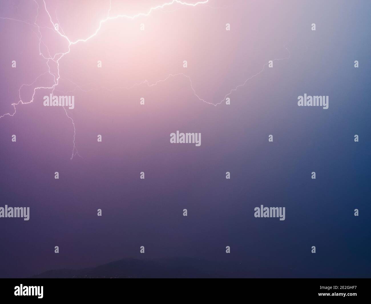 Lightning bolts in dramatic stormy sky Stock Photo - Alamy