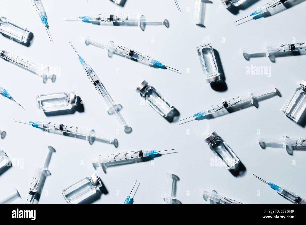 COVID-19 vaccine vials and syringes on white background Stock Photo - Alamy