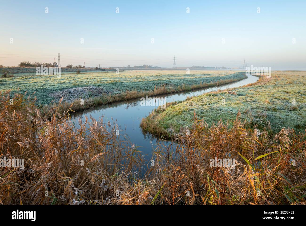 Marshland on the North Kent Coast at Seasalter with the London Array substation in the background. Stock Photo