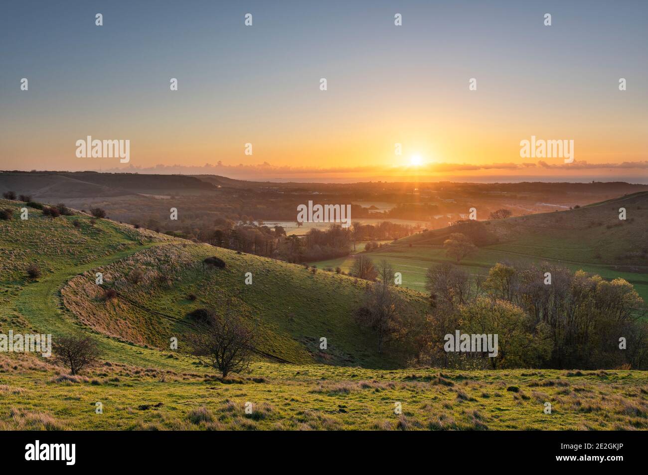Sunrise on the Folkestone Downs; part of the Kent Downs AONB. Stock Photo