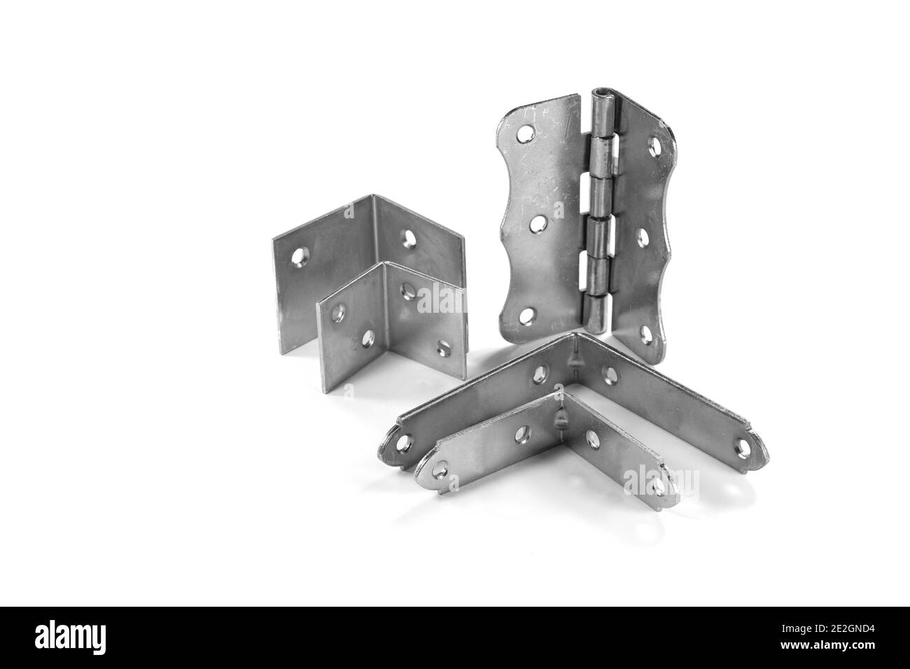 Mounting angle metal brackets isolated on white background. Stock Photo