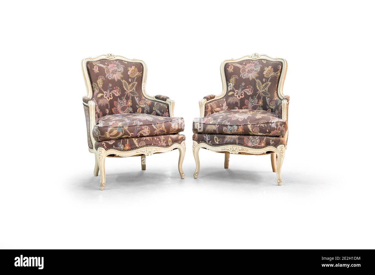 Pair of vintage wood chairs (bergeres) on the white background. Stock Photo