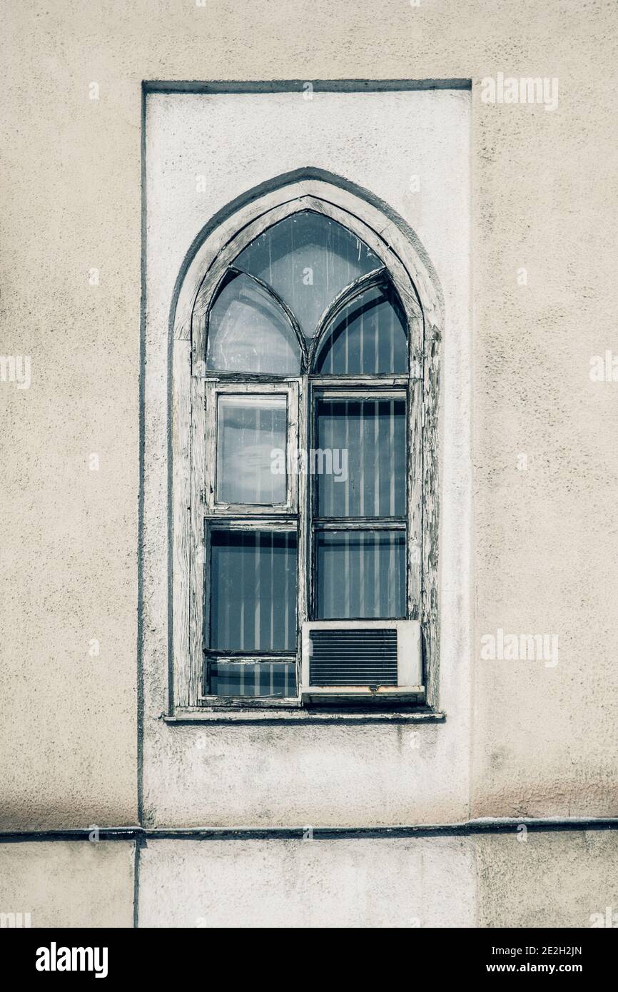Air conditioner compressor installed in old building Stock Photo