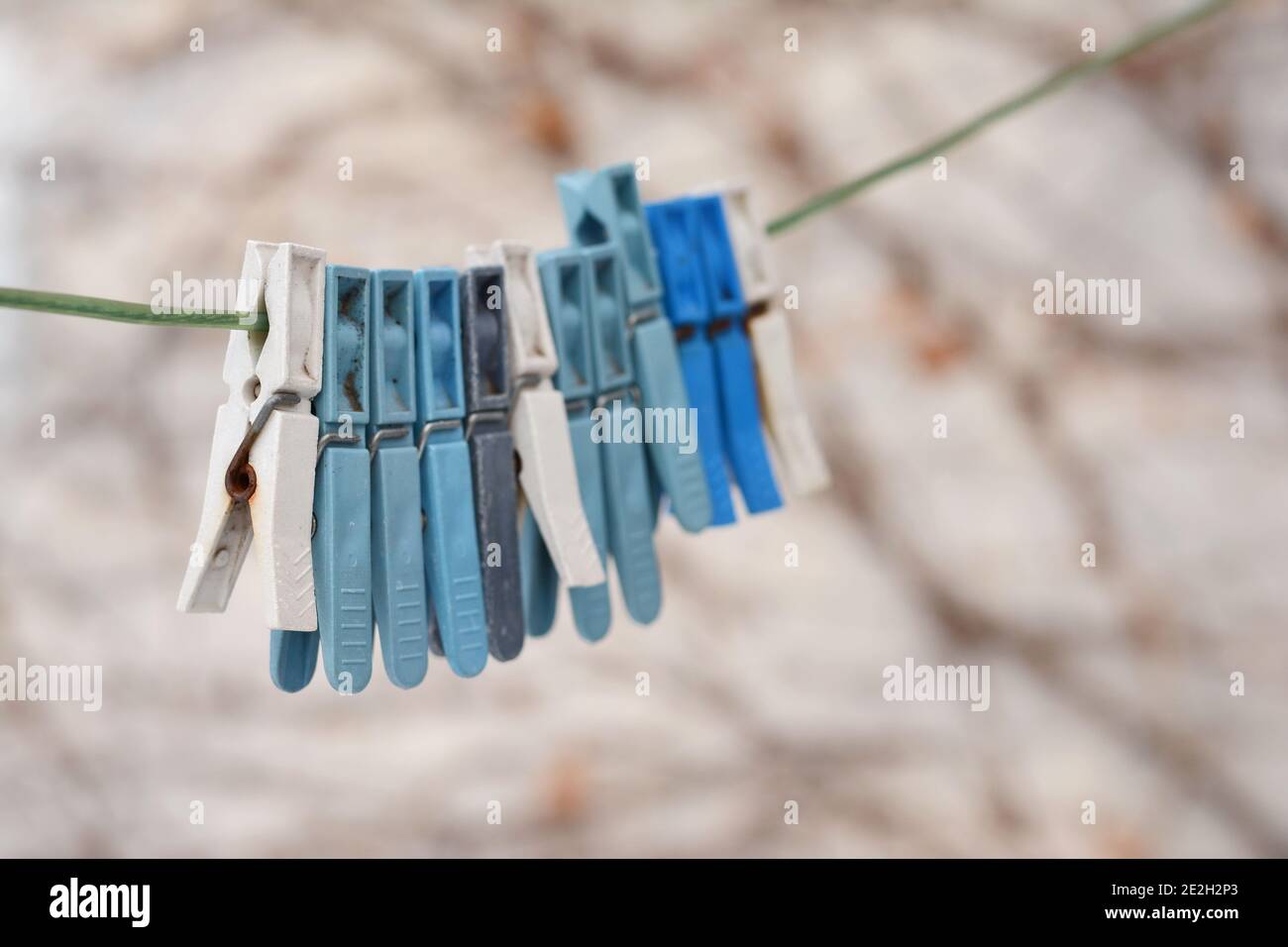 Clothespins on a rope. Stock Photo