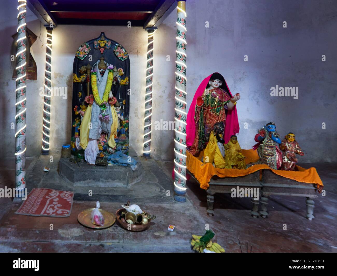 Kalna City, West Bengal, India. The faithful place offerings before their Hindu deities in the Rajbari Complex pf Temples in Kalna. Stock Photo