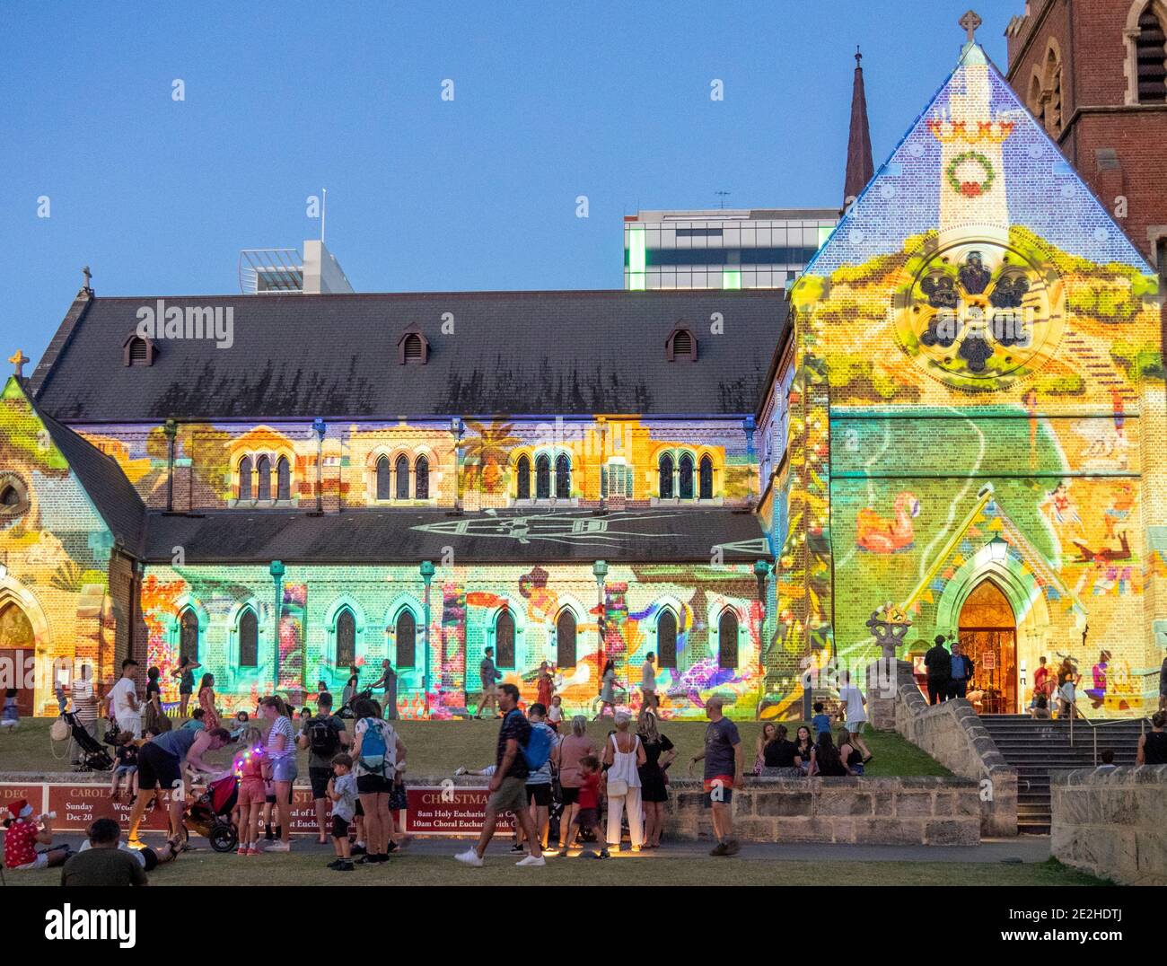 Christmas lights projected on to the side facade of St
