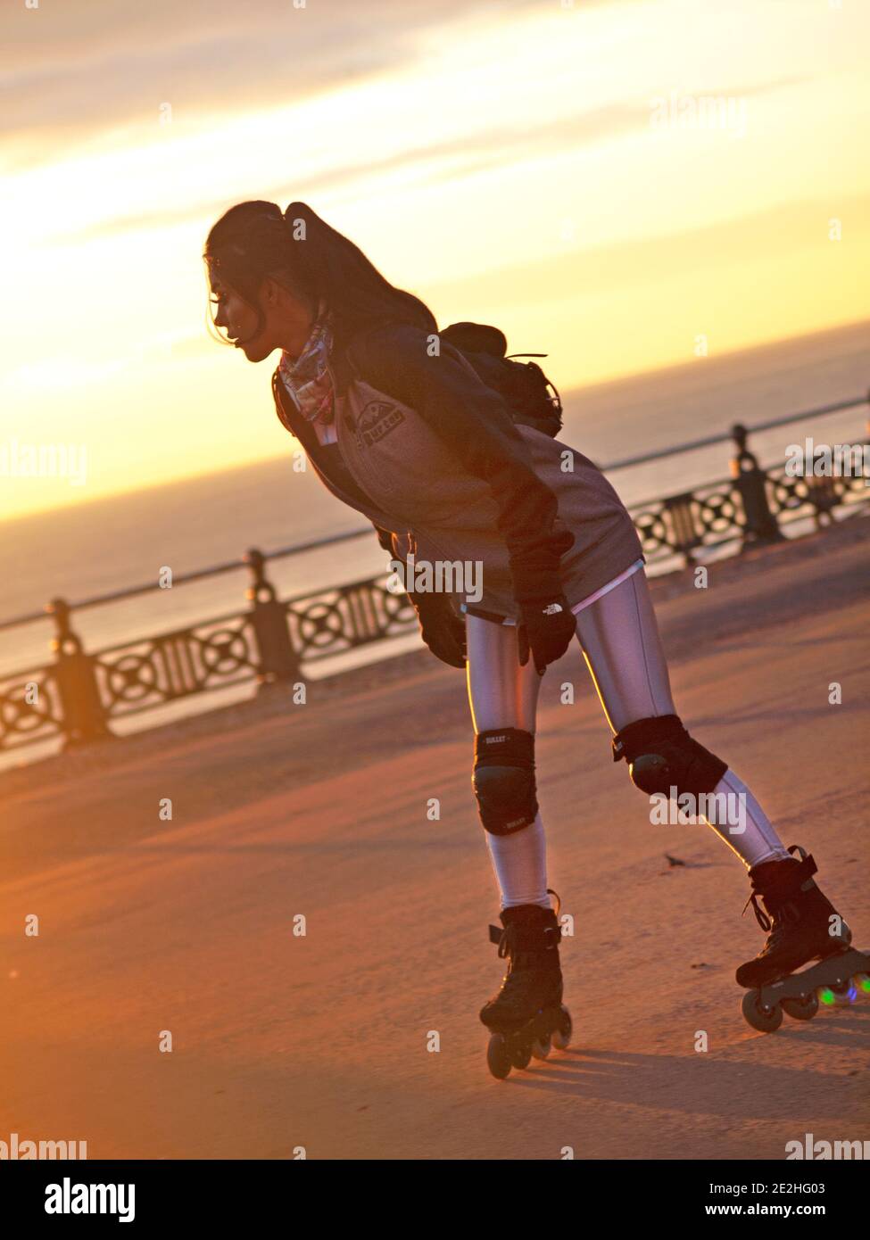 Rollerskating close to the Brighton seafront Stock Photo Alamy