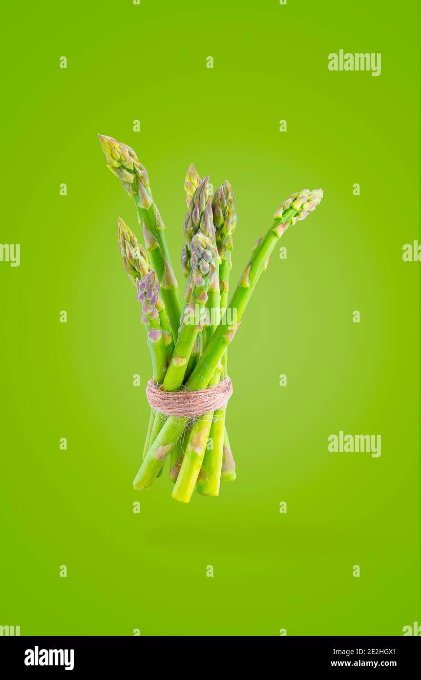 Creative idea layout with fresh vegetables on colored background Stock Photo
