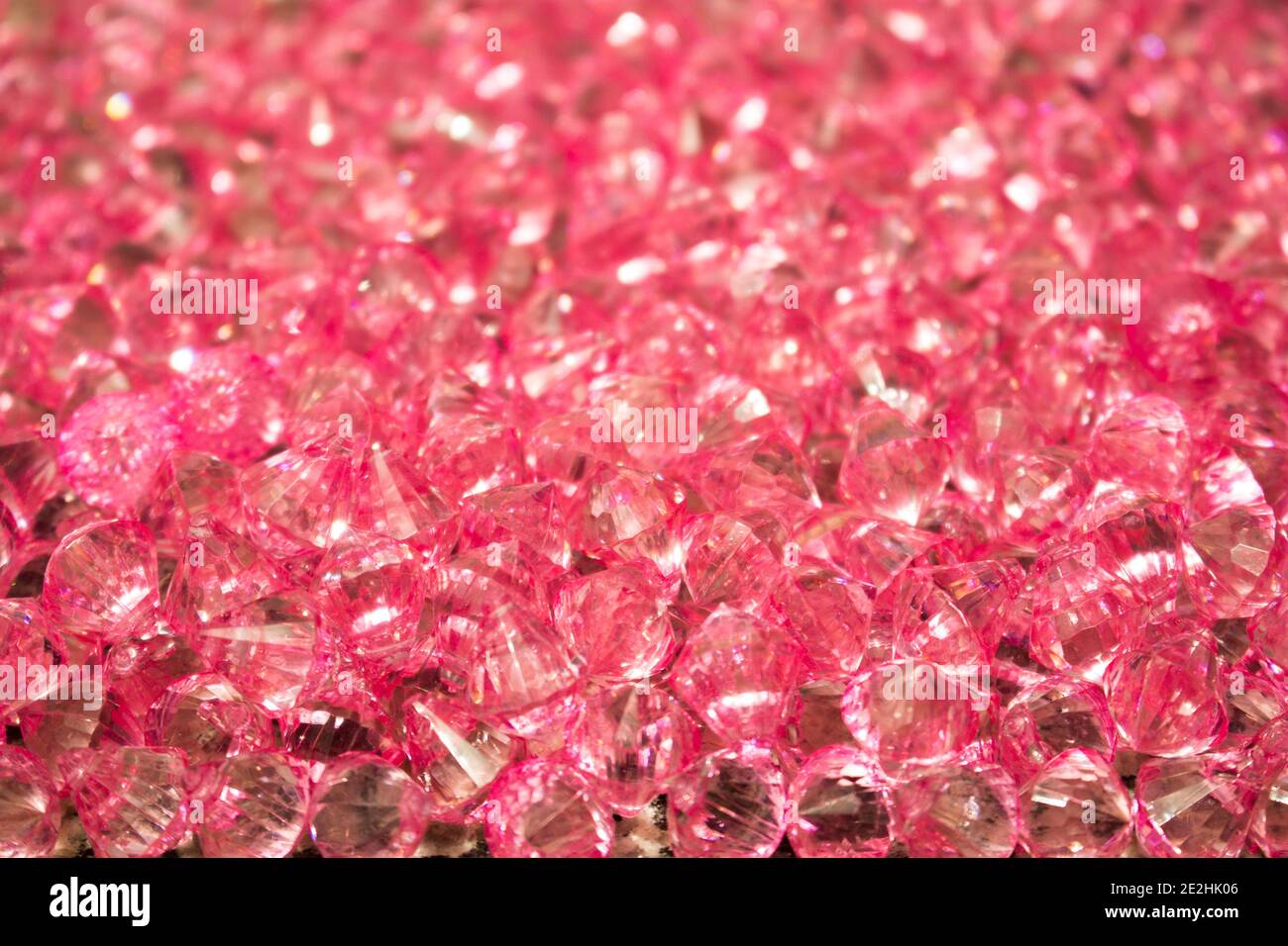 Group of pink glass beads together forming a texture Stock Photo