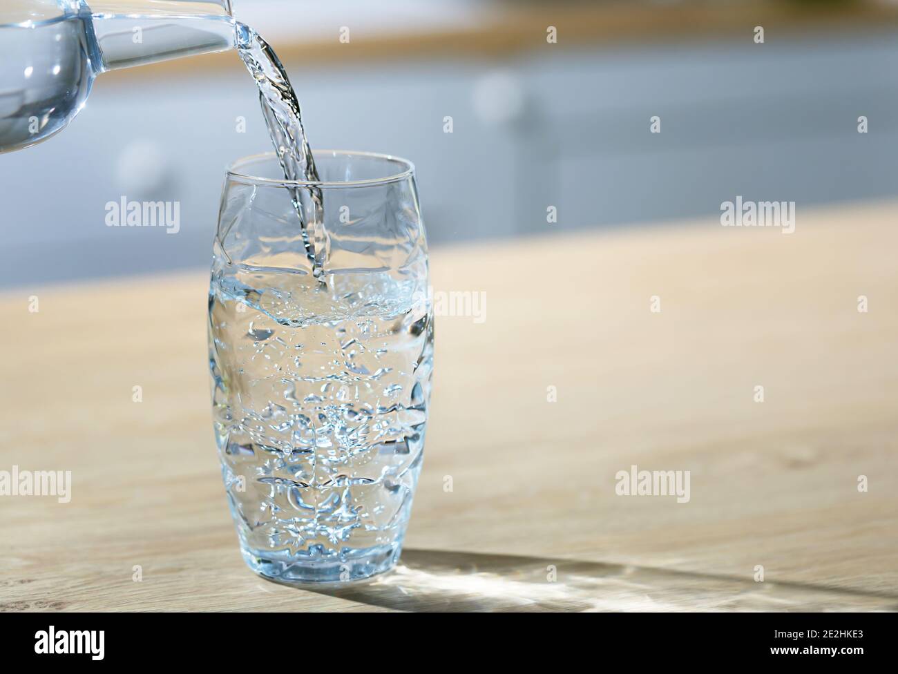 Pour Water Pitcher Glass Drinking Water Poured Jug Glass Blue Stock Photo  by ©Evgeniy_Bobkov 228440302