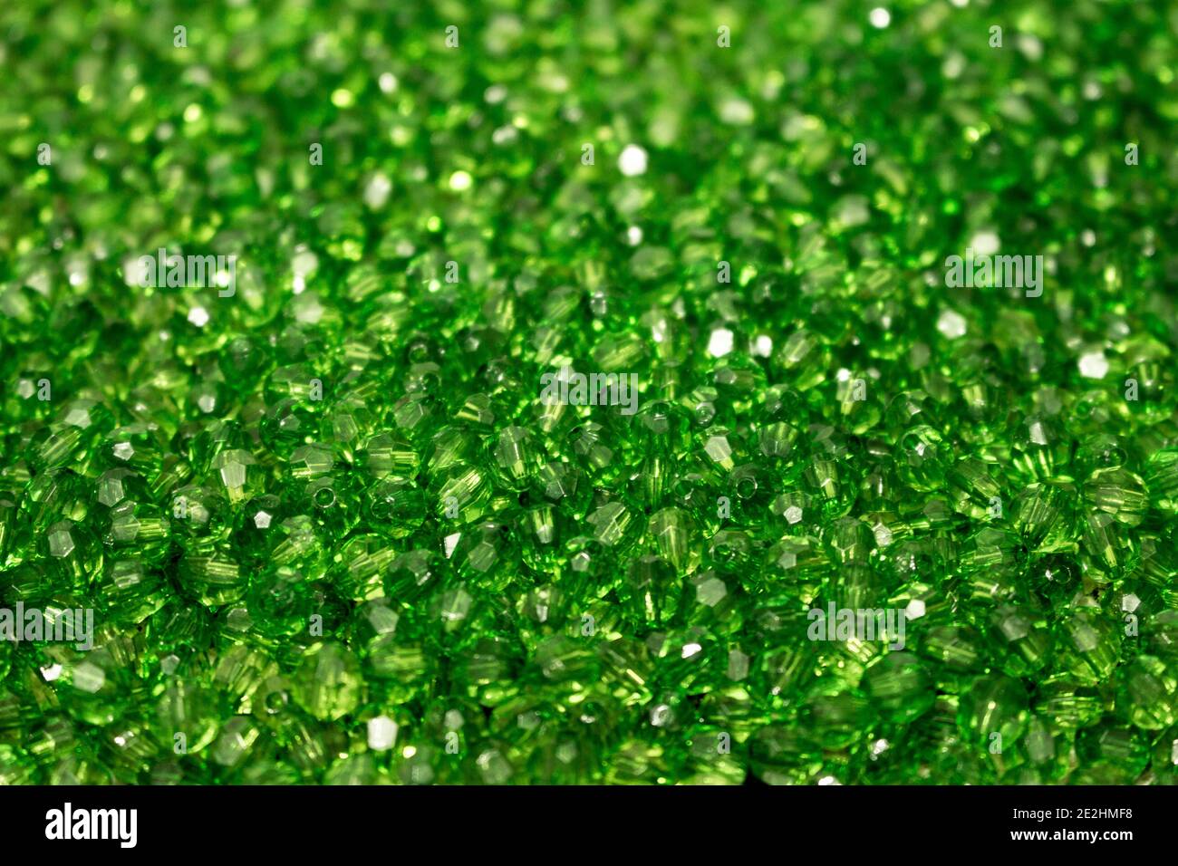 Group of green glass beads together forming a texture Stock Photo