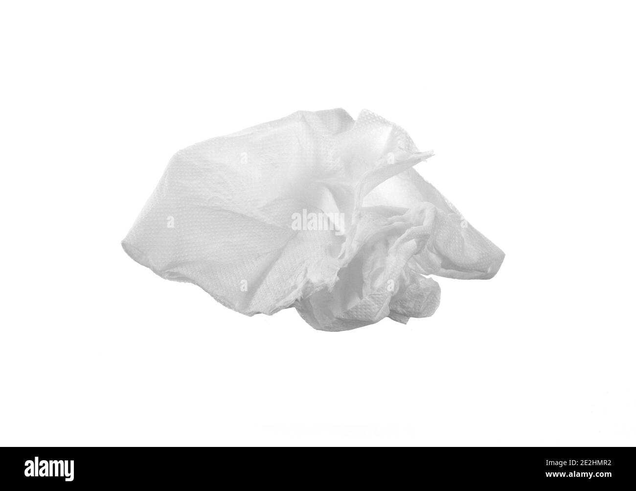 Used screwed paper tissue isolated on white background. Crumpled tissue