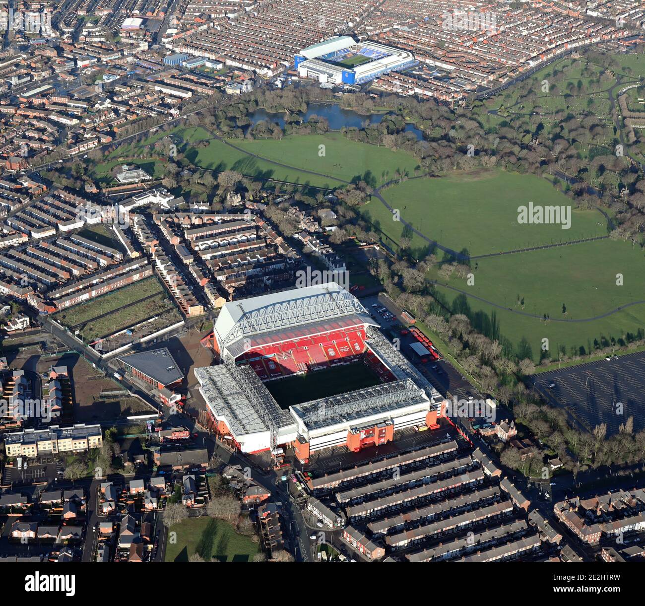 aerial view of Liverpool FC Anfield Stadium looking across Stanley Park to Everton FC Goodison Park stadium Stock Photo