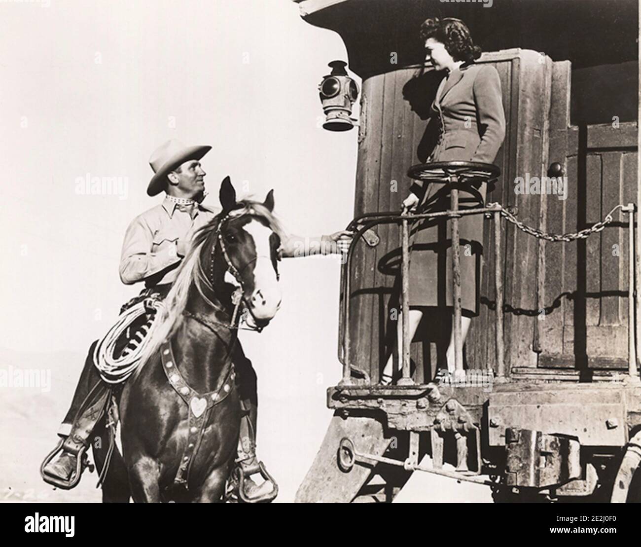 THE BLAZING SUN 1950 Columbia film with Gene Autry and Lynne Roberts Stock Photo
