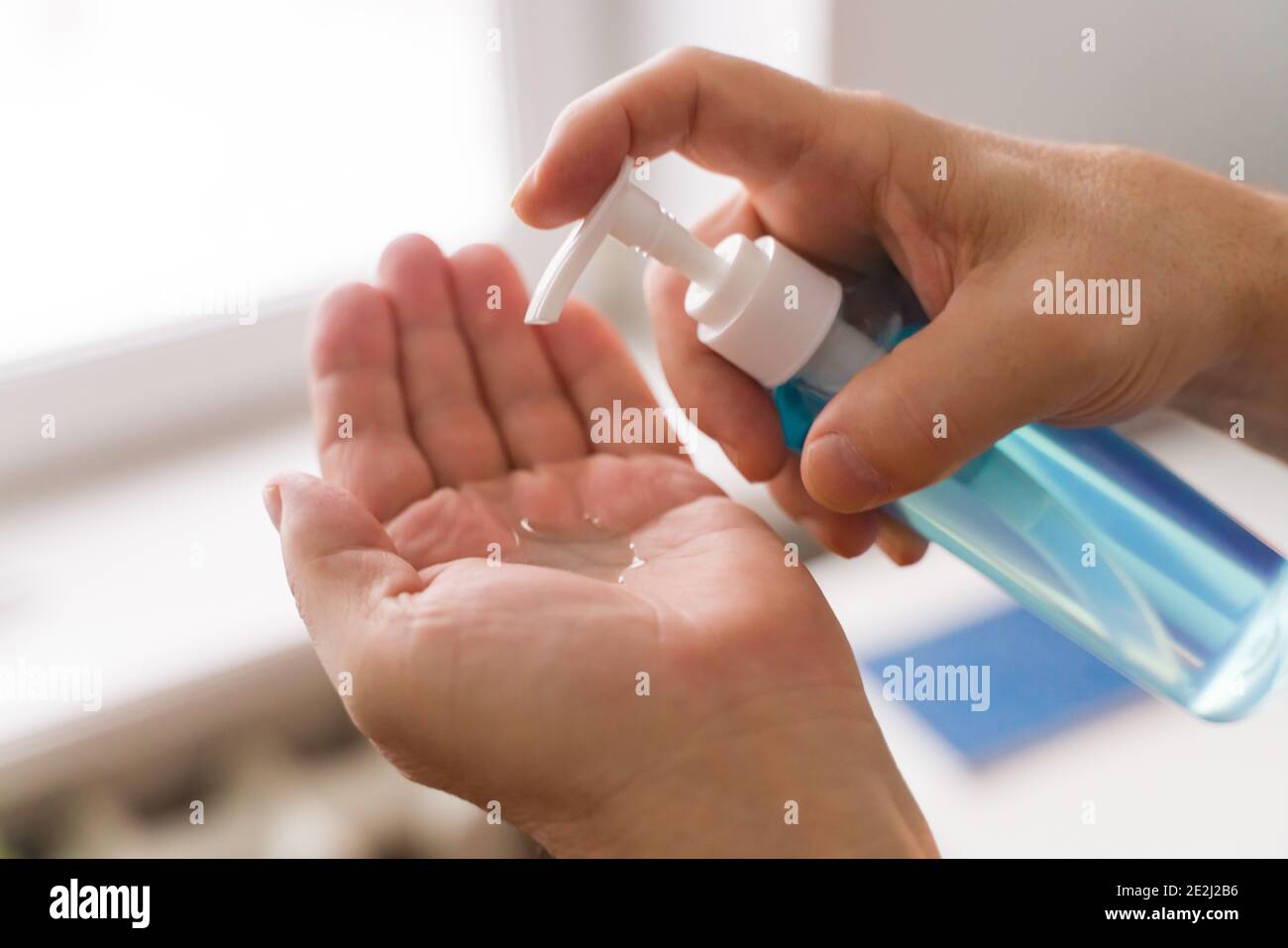 Alcohol-based sanitizer. Hand antiseptic treatment, Prevention of coronavirus Stock Photo